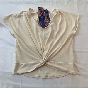 Cream short sleeve shirt with tie behind neck